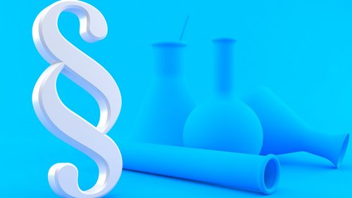 Chemische Laborinstrumente und ein Paragrafenzeichen