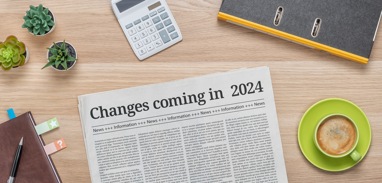 Eine Zeitung auf einem Schreibtisch mit der Überschrift Änderungen im Jahr 2024