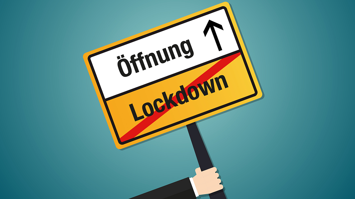 Straßenschild mit Beschriftung Öffnung und einem Pfeil sowie Lockdown durchgestrichen