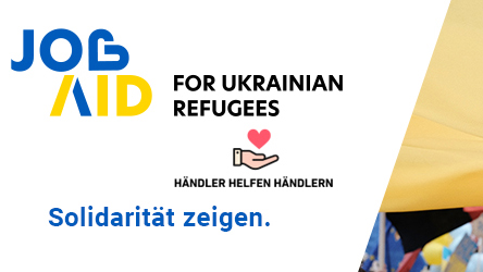 Auf der linken Seite sind die Logos der beiden Initiativen Job Aid und Händler helfen Händlern zu sehen, rechts ist ein Foto angeschnitten.