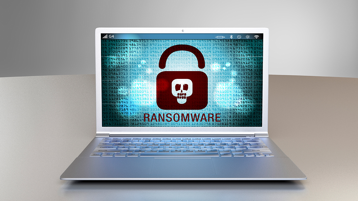 Laptop auf dem ein Schloss mit der Beschriftung Ransomware zu sehen ist.
