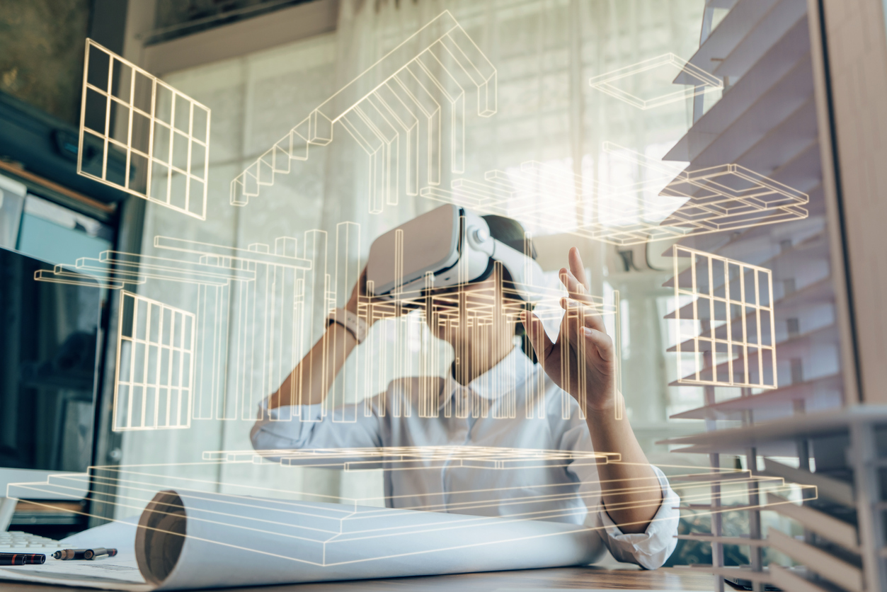 Konzept futuristisches Design. Asiatische Architektin oder Ingenieurin trägt VR-Headset für die Arbeit 3D-Architektur-Betonfertigteil-Gebäudemodell mit BIM-Technologie und Virtual-Reality-Technologie.